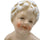 Antique Porcelain Putto Figurine Young Cherub Boy Holding Flowers - Poppy's Vintage Clothing